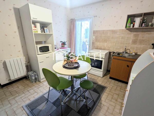 Maison avec 2 logements F5 et F3. Terrain.