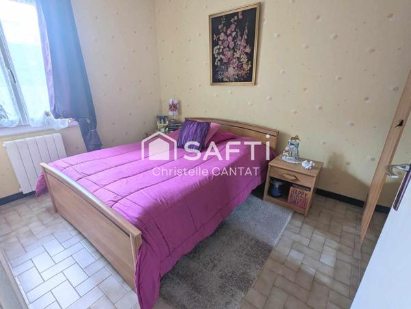 Maison avec 2 logements F5 et F3. Terrain.