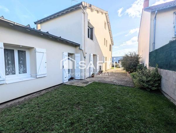 Maison avec 2 logements F5 et F3. Terrain.