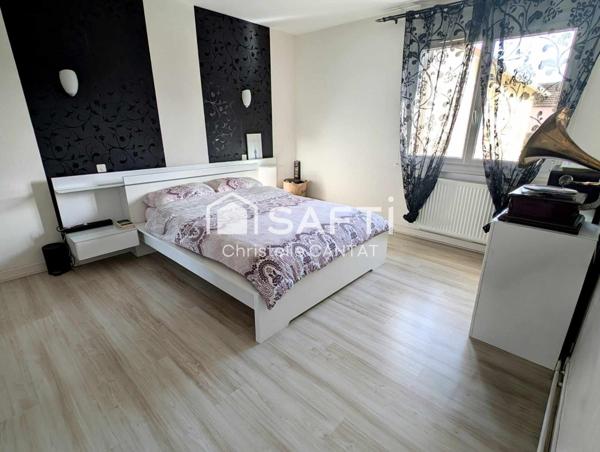 Maison avec 2 logements F5 et F3. Terrain.