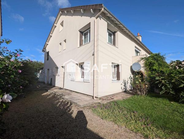 Maison avec 2 logements F5 et F3. Terrain.