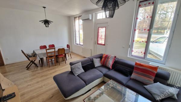 Maison à proximité de tous commerces.