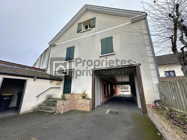 Appartement 1 chambre et grand garage fermé