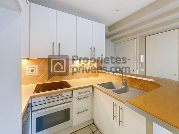 Appartement 1 chambre et grand garage fermé