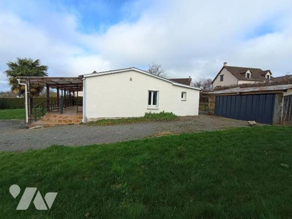 Centre ville de Saint Georges des Groseillers, une maison d'habitation de plain-pied et de six ...
