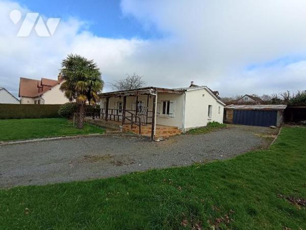 Centre ville de Saint Georges des Groseillers, une maison d'habitation de plain-pied et de six ...