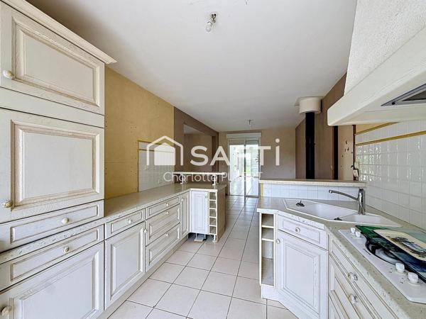 Grande maison avec entrepôt de 150m2
