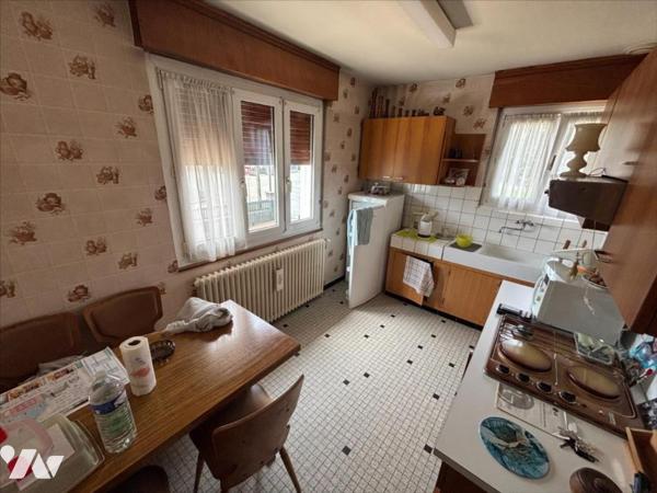 Maison 3 pièces (environ 60 m² habitables) située dans un secteur calme