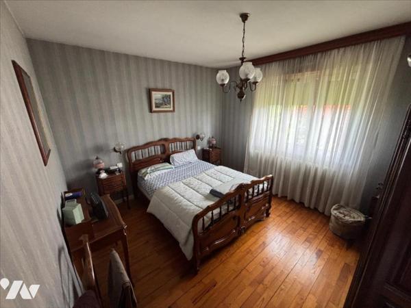 Maison 3 pièces (environ 60 m² habitables) située dans un secteur calme