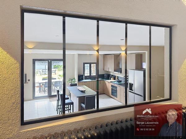 MAISON ATHYPIQUE DE 250M² AVEC JARDIN
