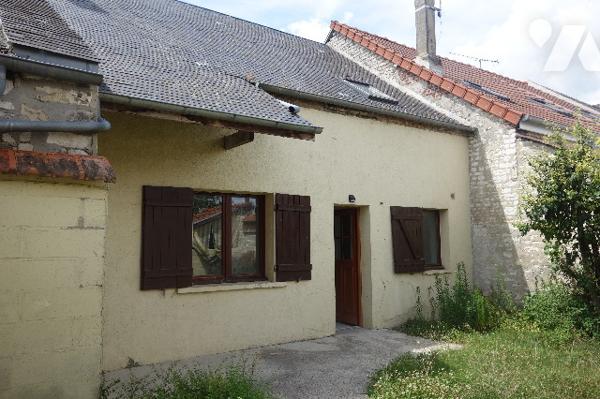 Maison, cour et garage
