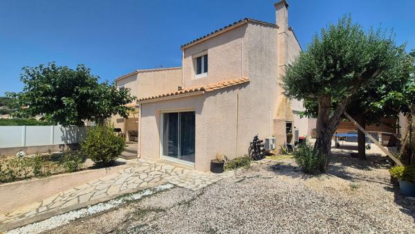 Maison familiale 108.5m² 4 chambres avec deux suites, garage aménagé et jardin