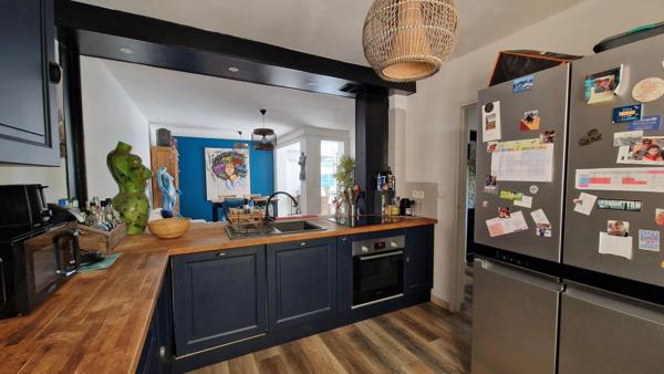 Maison familiale 108.5m² 4 chambres avec deux suites, garage aménagé et jardin