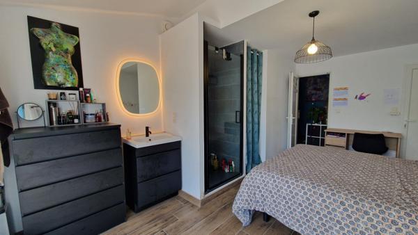 Maison familiale 108.5m² 4 chambres avec deux suites, garage aménagé et jardin