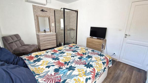 Maison familiale 108.5m² 4 chambres avec deux suites, garage aménagé et jardin
