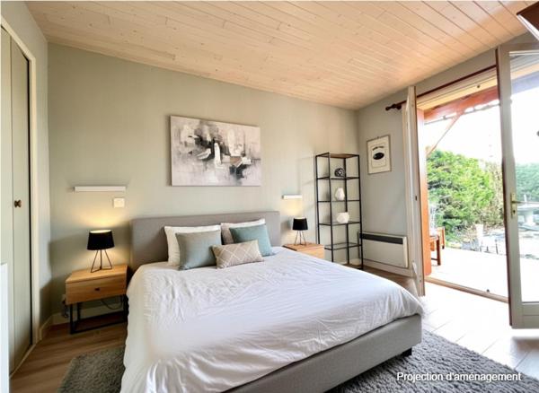 Maison avec jardin, garage et terrain constructible