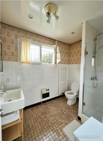 Maison avec jardin, garage et terrain constructible