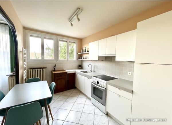 Maison avec jardin, garage et terrain constructible