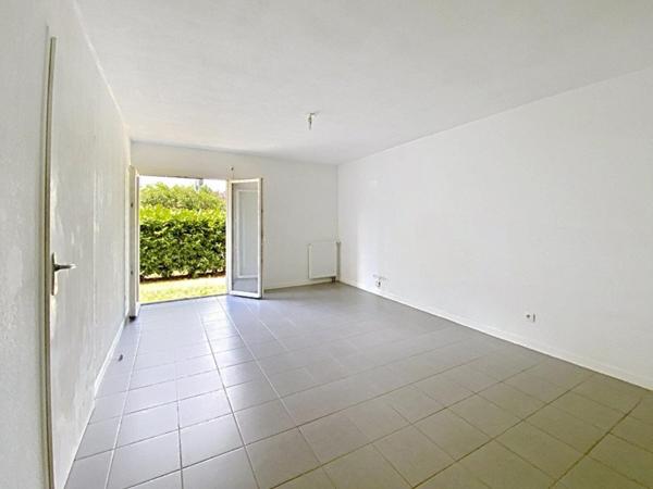 T2 en rez de jardin avec place de parking couverte