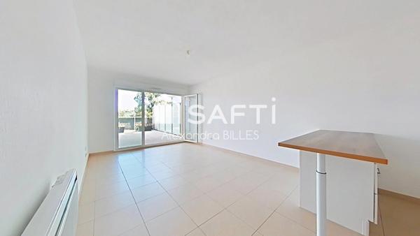 Appartement T3 avec terrasse et place de parking sécurisé