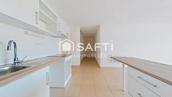 Appartement T3 avec terrasse et place de parking sécurisé