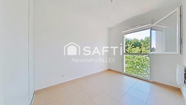 Appartement T3 avec terrasse et place de parking sécurisé