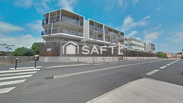 Appartement T3 avec terrasse et place de parking sécurisé