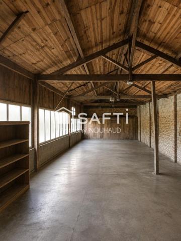 Bien à fort potentiel d'aménagement (immeuble, loft...)