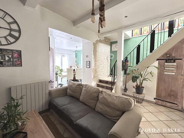 MAISON DE VILLE AVEC JARDIN ET GARAGE