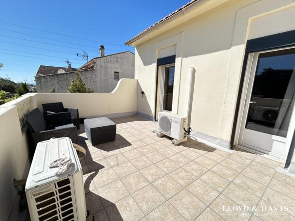 MAISON DE VILLE AVEC JARDIN ET GARAGE