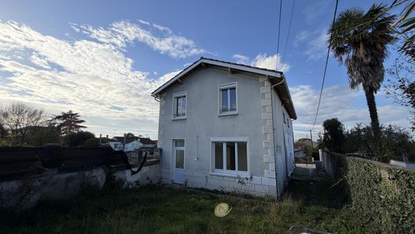 Proche centre ville maison 4 chambres ,jardin, et 4 garages!