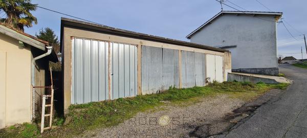 Proche centre ville maison 4 chambres ,jardin, et 4 garages!
