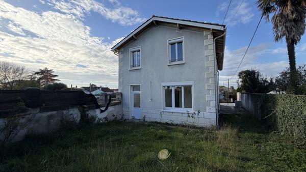 Proche centre ville maison 4 chambres ,jardin, et 4 garages!