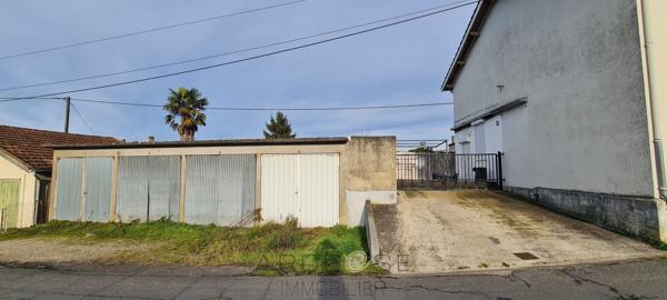 Proche centre ville maison 4 chambres ,jardin, et 4 garages!