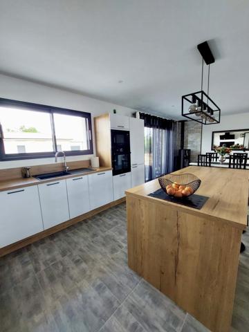 Maison récente plain pied trois chambres