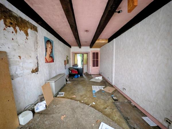 Immeuble à rénover avec beau potentiel