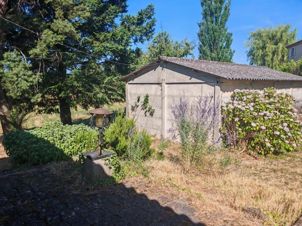 Maison de ville - Garage - Terrain 5000m2
