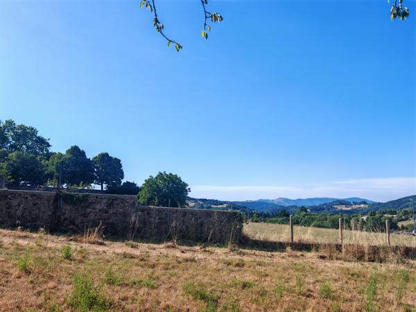 Maison de ville - Garage - Terrain 5000m2