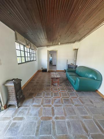 Maison de ville - Garage - Terrain 5000m2
