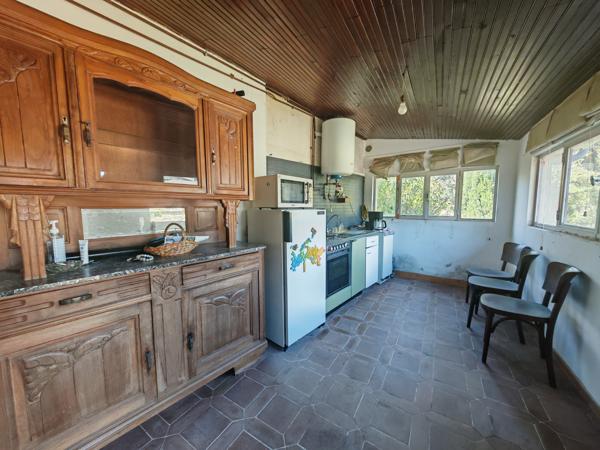 Maison de ville - Garage - Terrain 5000m2