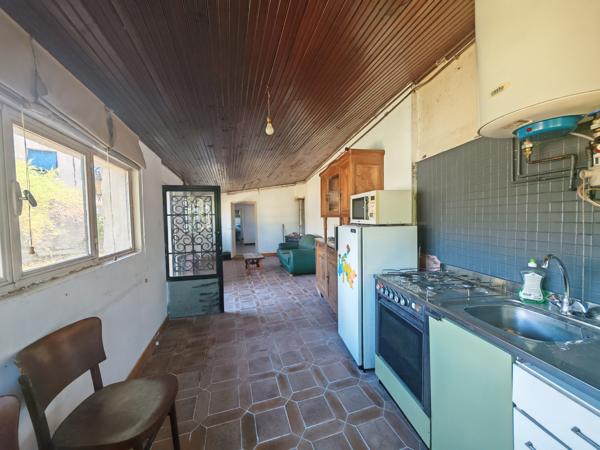 Maison de ville - Garage - Terrain 5000m2