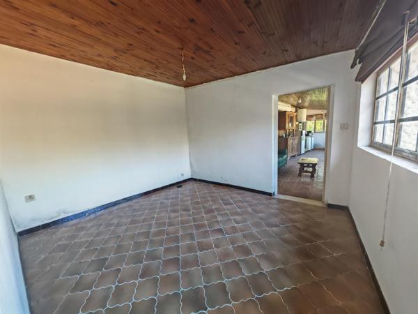 Maison de ville - Garage - Terrain 5000m2