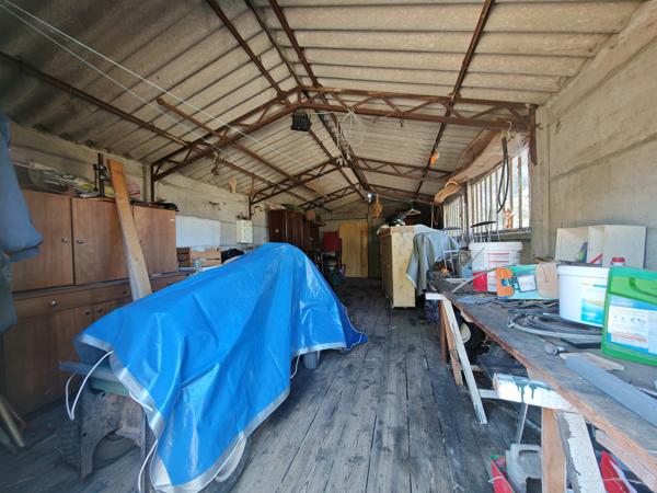 Maison de ville - Garage - Terrain 5000m2