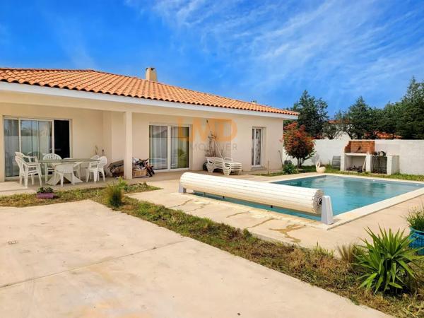 Maison de plain-pied sans murs mitoyens de 120 m2 avec piscine