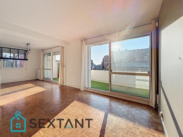 Appartement de 115 m2 avec terrasse plein sud entre centre ville et la plage