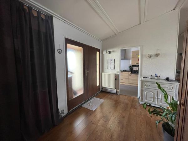 Maison plain-pied avec jardin et garage