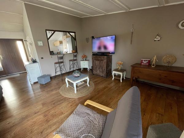 Maison plain-pied avec jardin et garage