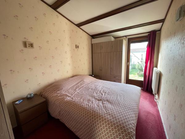 Maison plain-pied avec jardin et garage