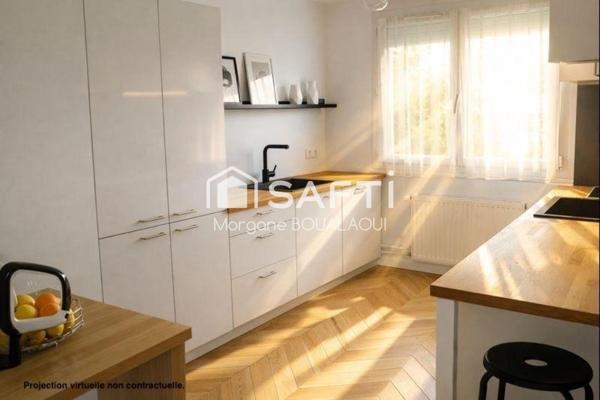 APPARTEMENT 4 PIÈCES - 83 M² - PARKING ET CAVE