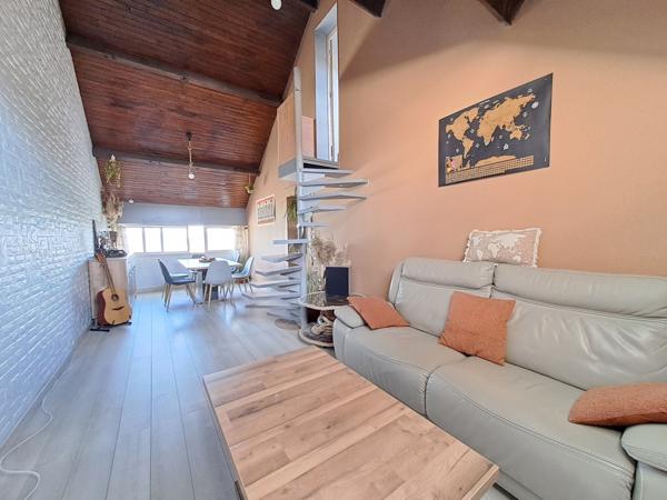 Coup de coeur pour cet appartement duplex situé au dernier étage !